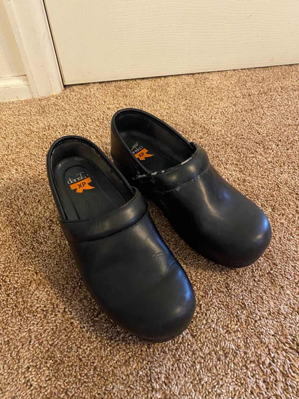 Dansko Black Leather Clogs
